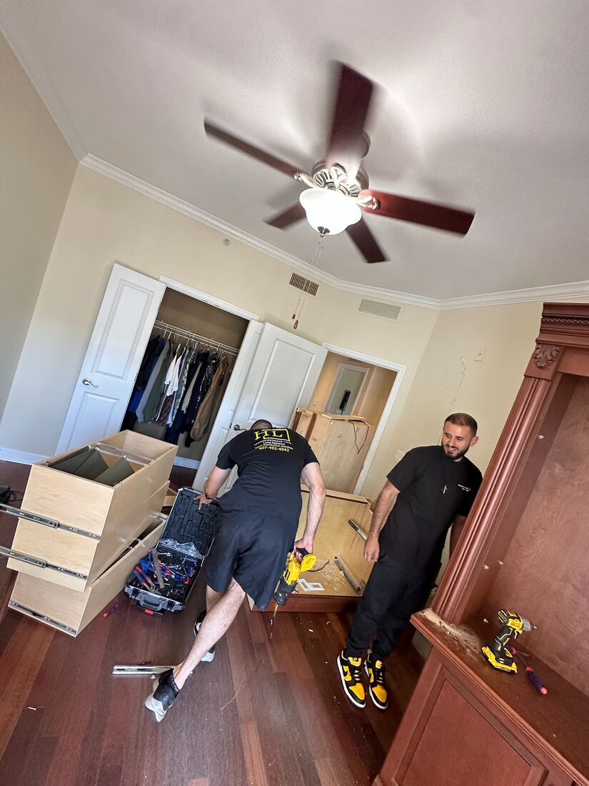 Heavy Lifters movers carefully loading boxes and furniture — movers serving St. Augustine, FL
